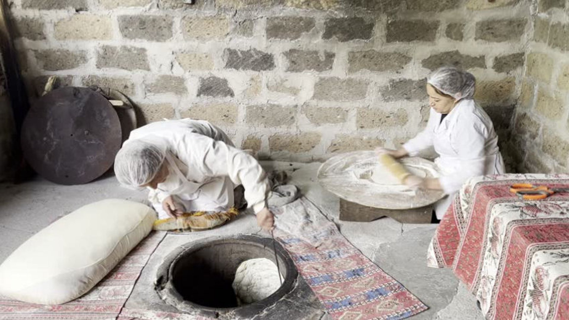 Women making traditional lavash bread.